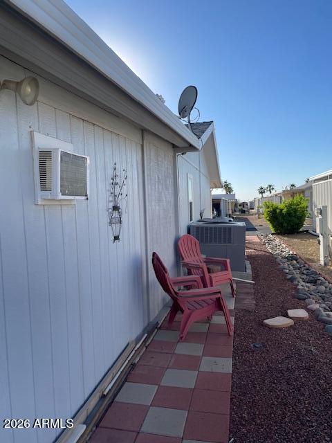 3700 South Tomahawk Road, Unit 59 Apache Junction, AZ 85119 - Photo 19 of 19 a view of a porch with furniture and a rug
