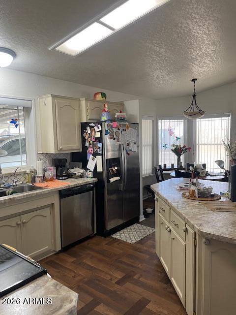 3700 South Tomahawk Road, Unit 59 Apache Junction, AZ 85119 - Photo 10 of 19 a kitchen with stainless steel appliances granite countertop a sink stove and refrigerator