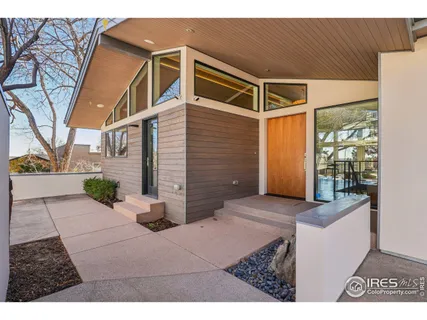 a view of a living room and dining room