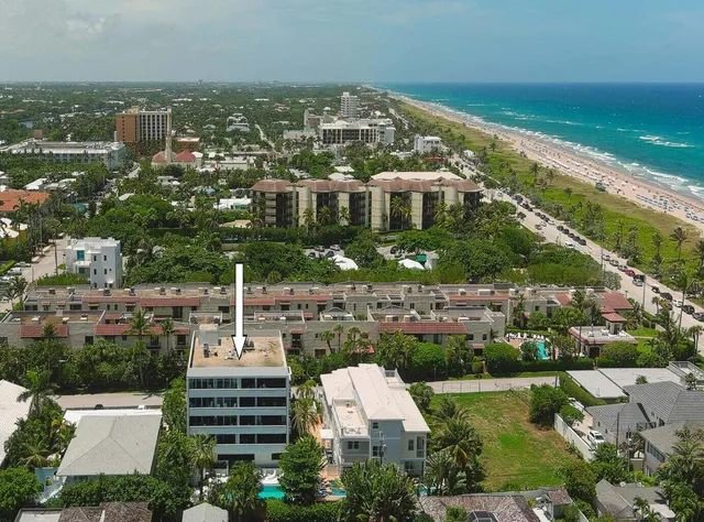 a view of city with tall buildings