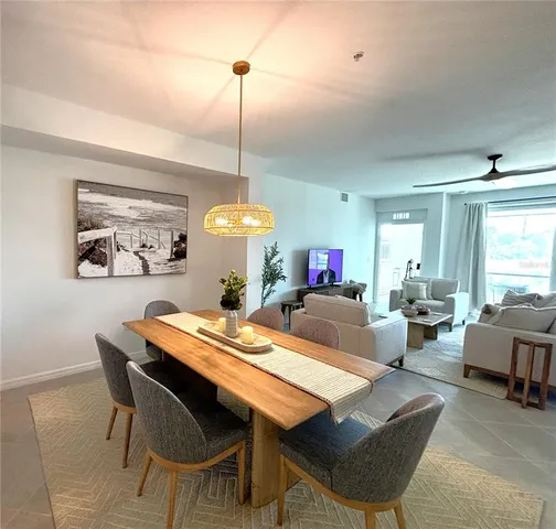 a view of a dining room and a livingroom