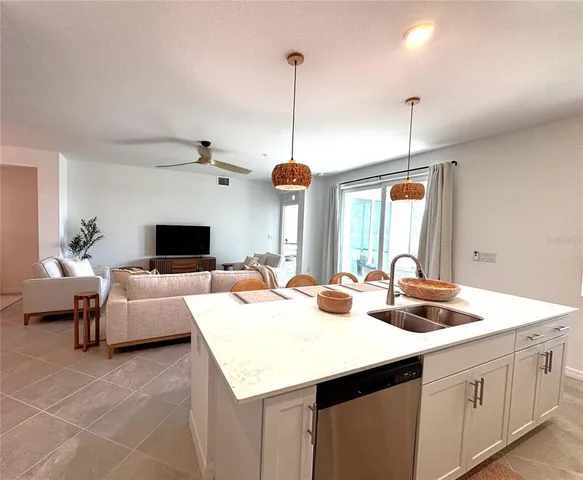 a living room with furniture and window
