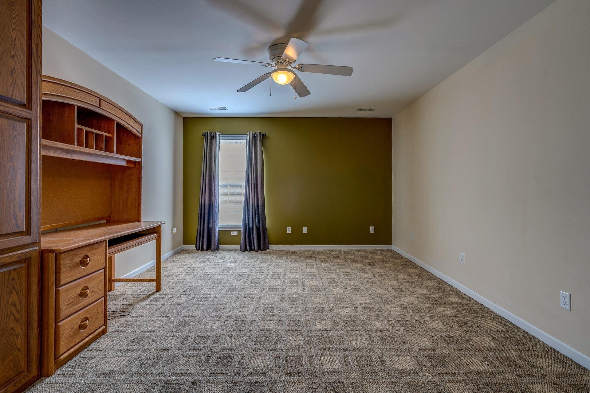1735 Ruritan Road Rocky Mount, VA 24151 - Photo 22 of 51 a view of an empty room with window and cabinet