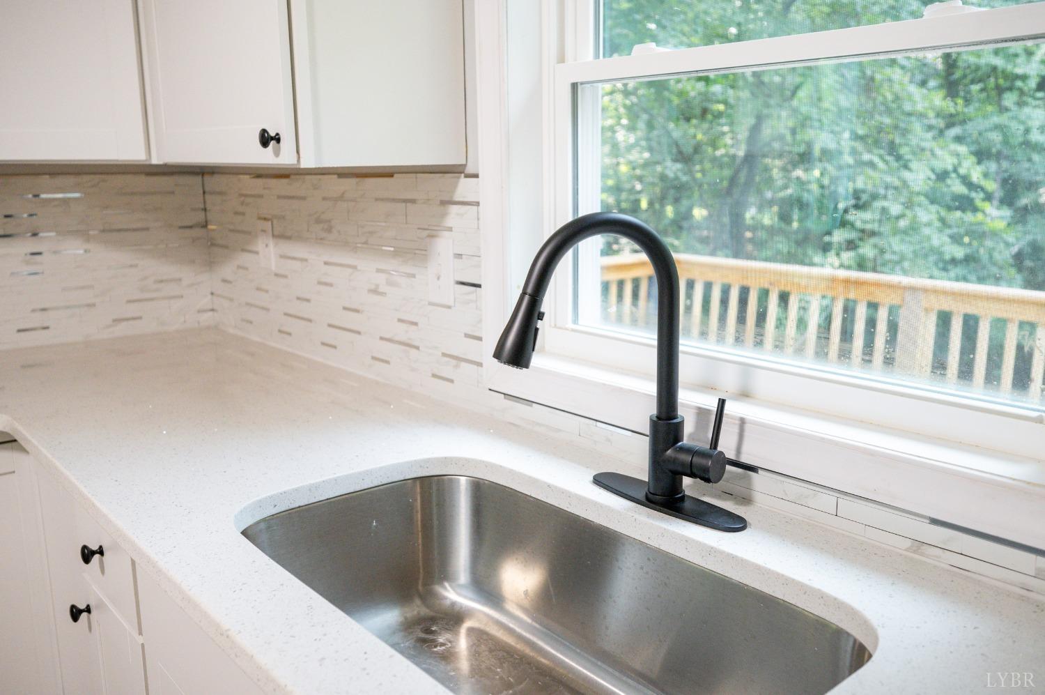 577 Thomas Road Madison Heights, VA 24572 - Photo 25 of 40 a kitchen with a sink and a window