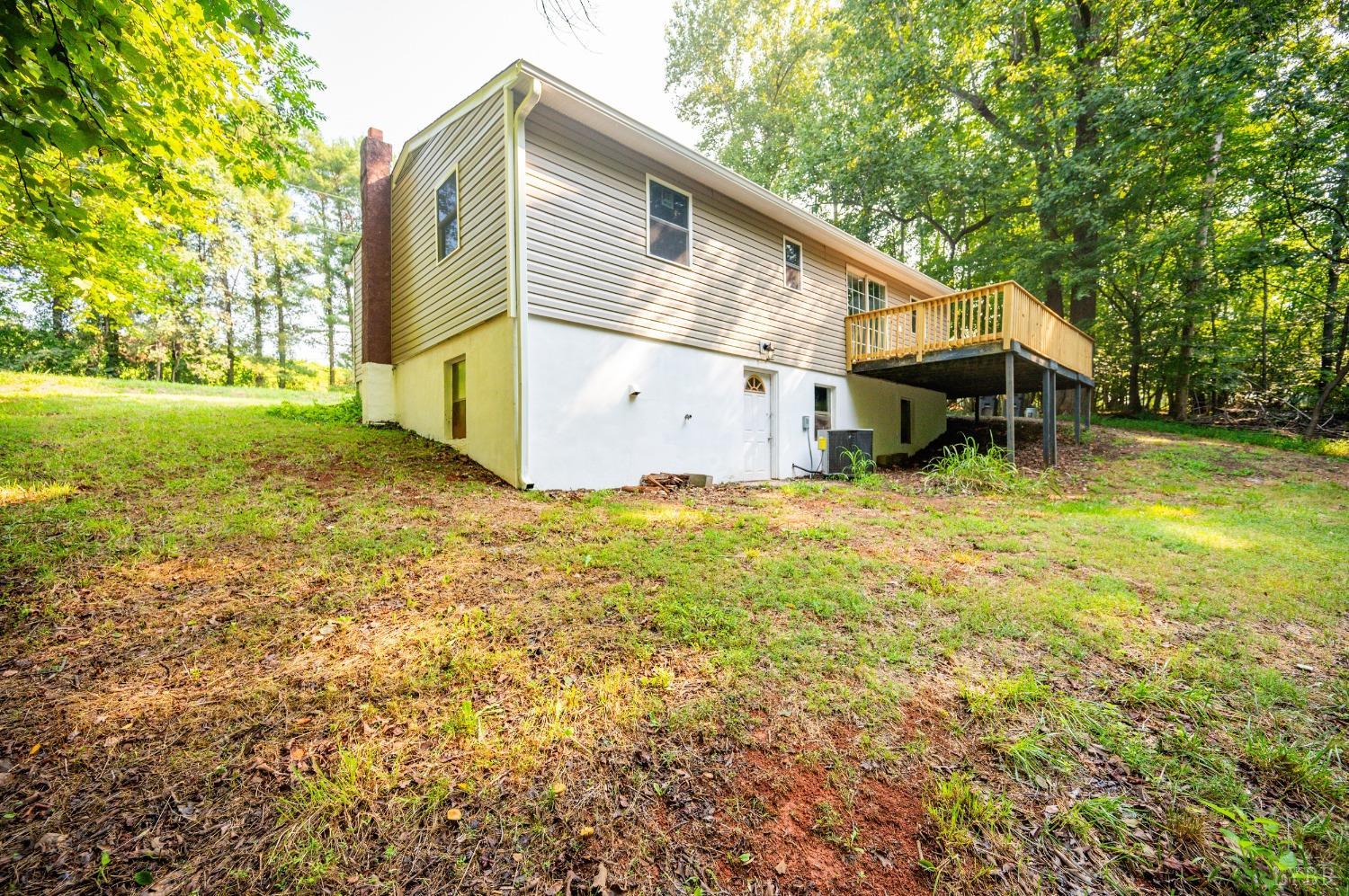 577 Thomas Road Madison Heights, VA 24572 - Photo 31 of 40 a view of a house with backyard and tree