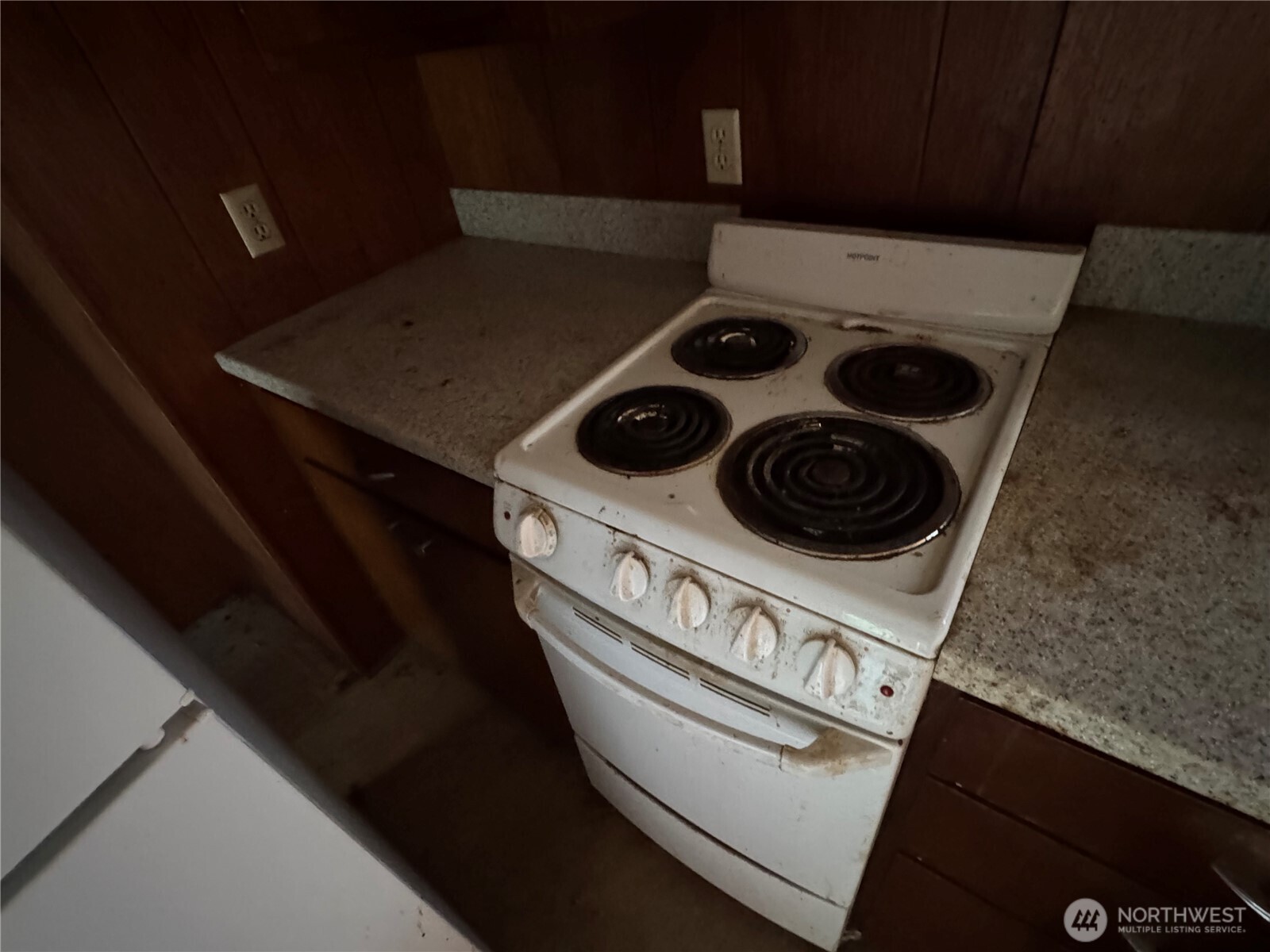 1284 Dines Point Road Greenbank, WA 98253 - Photo 8 of 39 a close view of stove and microwave