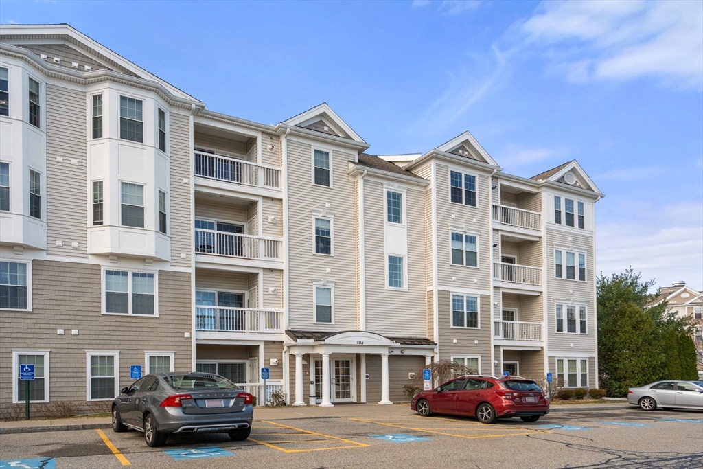 204 Clocktower Drive, Unit 206 Waltham, MA 02452 - Photo 3 of 27 a building view
