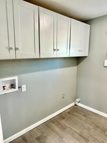 a bathroom with a toilet and a bathtub