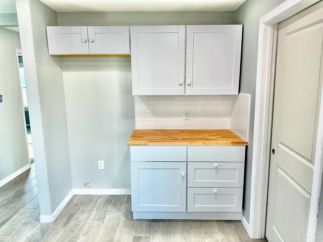 a view of walk in closet with window