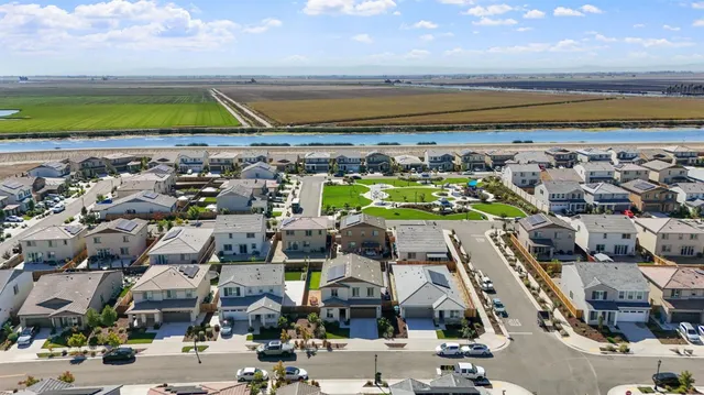 a view of swimming pool with an ocean and beach