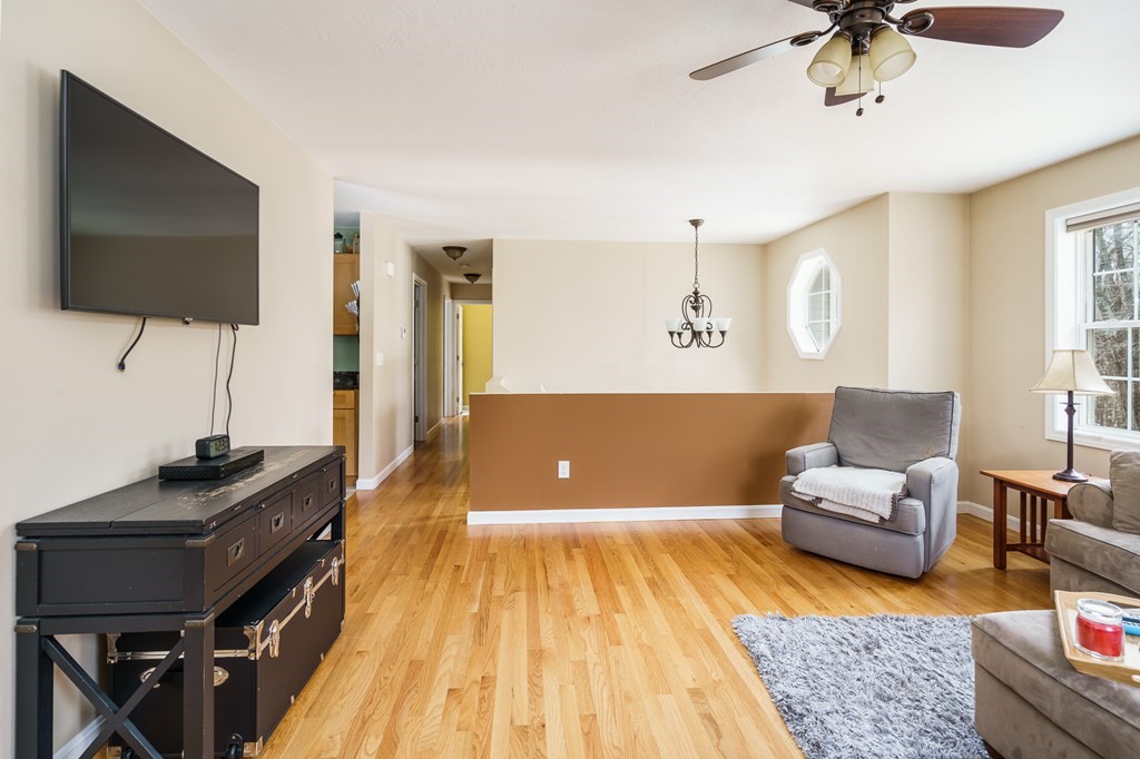 195 Brickyard Road Southampton, MA 01073 - Photo 11 of 42 a living room with a couch and a flat screen tv