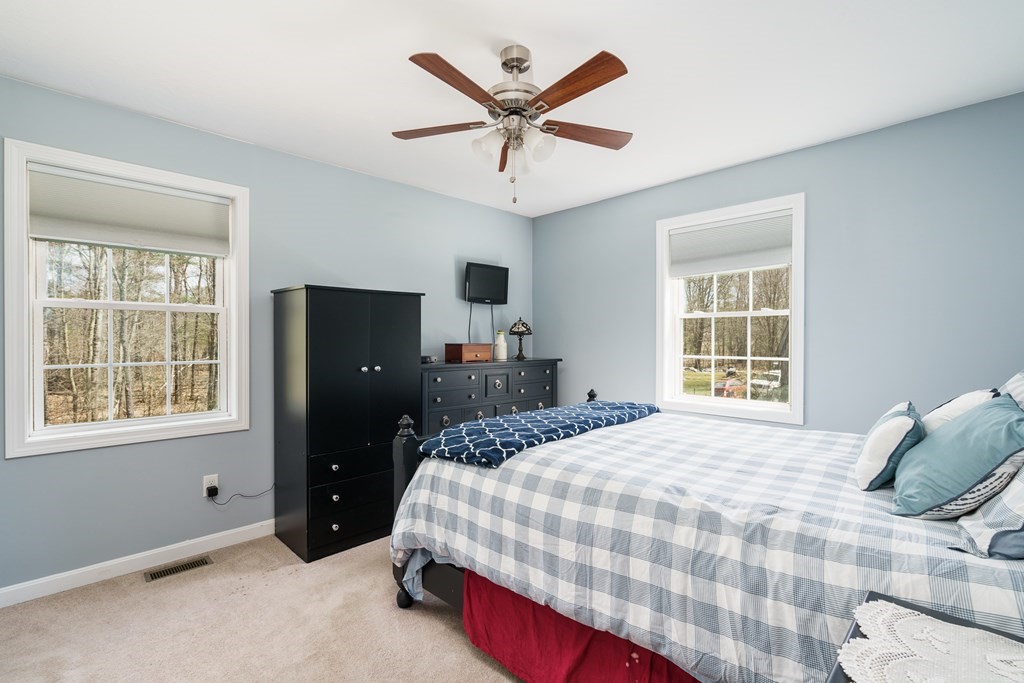195 Brickyard Road Southampton, MA 01073 - Photo 20 of 42 a bedroom with a bed and window