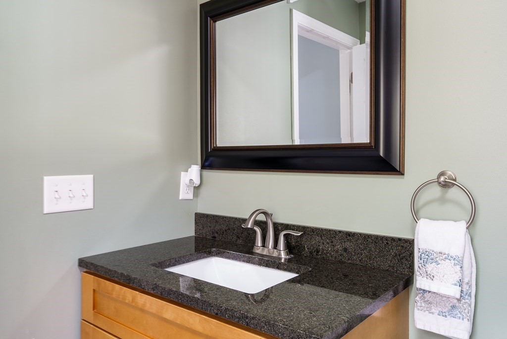 195 Brickyard Road Southampton, MA 01073 - Photo 32 of 42 a bathroom with a sink and a mirror