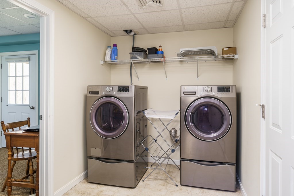 195 Brickyard Road Southampton, MA 01073 - Photo 34 of 42 a view of storage and utility room with washer and dryer