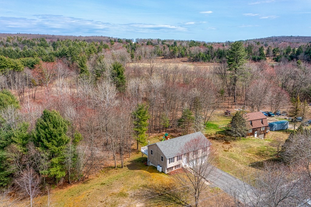 195 Brickyard Road Southampton, MA 01073 - Photo 40 of 42 a view of a lake with a yard