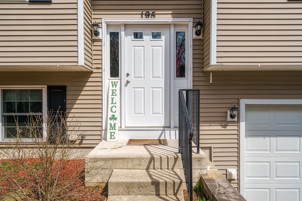 195 Brickyard Road Southampton, MA 01073 - Photo 6 of 42 a front view of a house with a yard