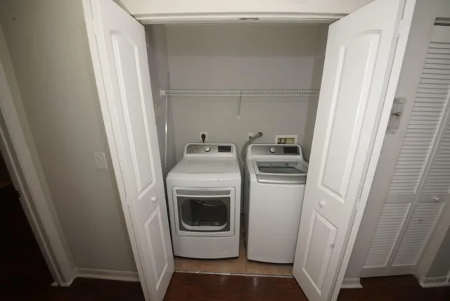 a utility room with dryer and washer