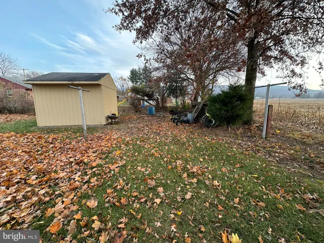 a kitchen with a sink cabinets and window