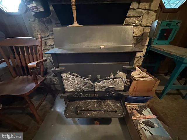 a living room with furniture fireplace and piano