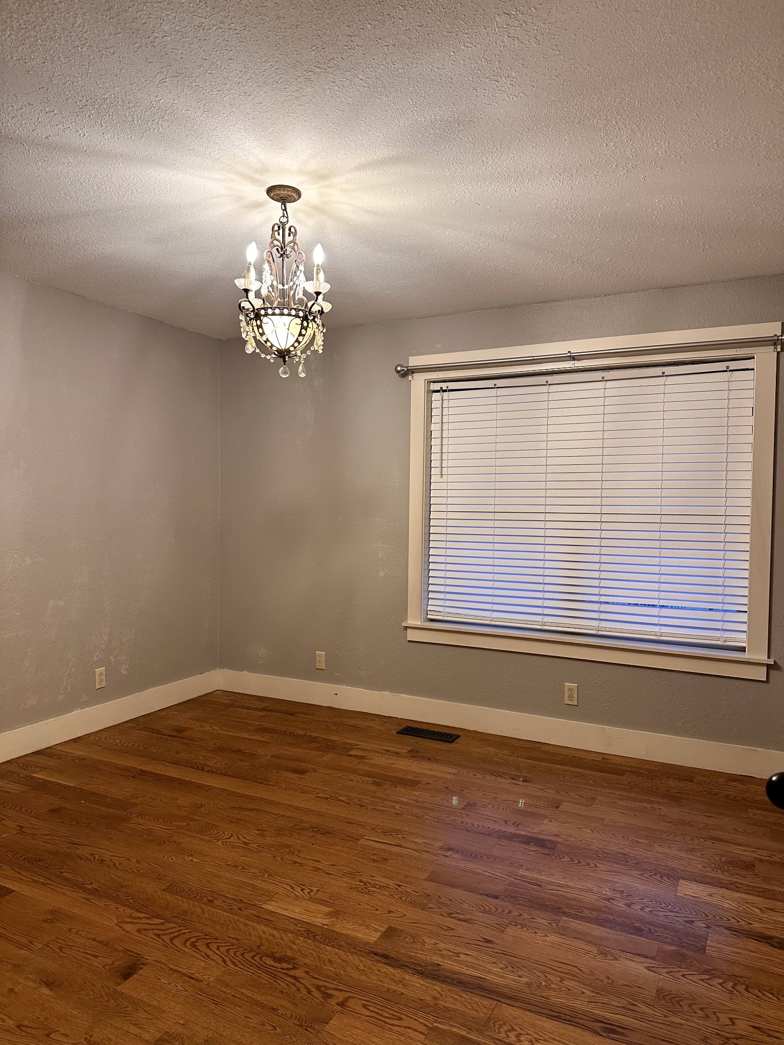433 O'Neal Road Livingston, TN 38570 - Photo 18 of 42 a view of wooden floor chandelier and window in a room