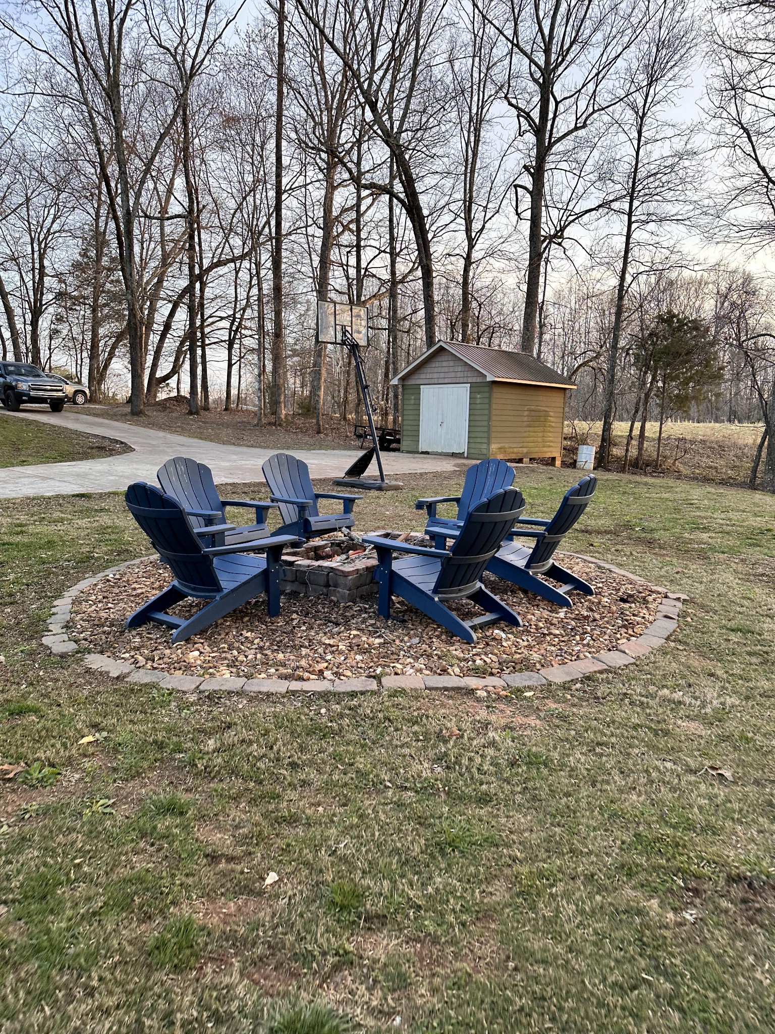 433 O'Neal Road Livingston, TN 38570 - Photo 38 of 42 a backyard of a house with barbeque oven and outdoor seating