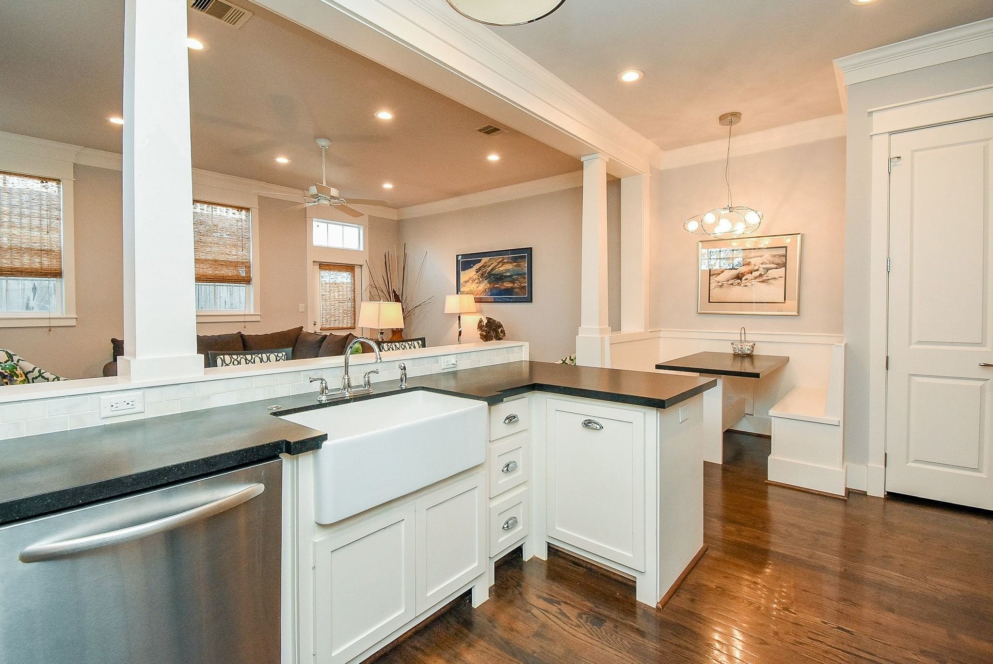 1036 Kern Street Houston, TX 77009 - Photo 16 of 47 View from near the cooktop. There is a hidden trashcan pull out cabinet near the sink. Opposite the kitchen is the private office area (on right) and a built-in breakfast table (on left).