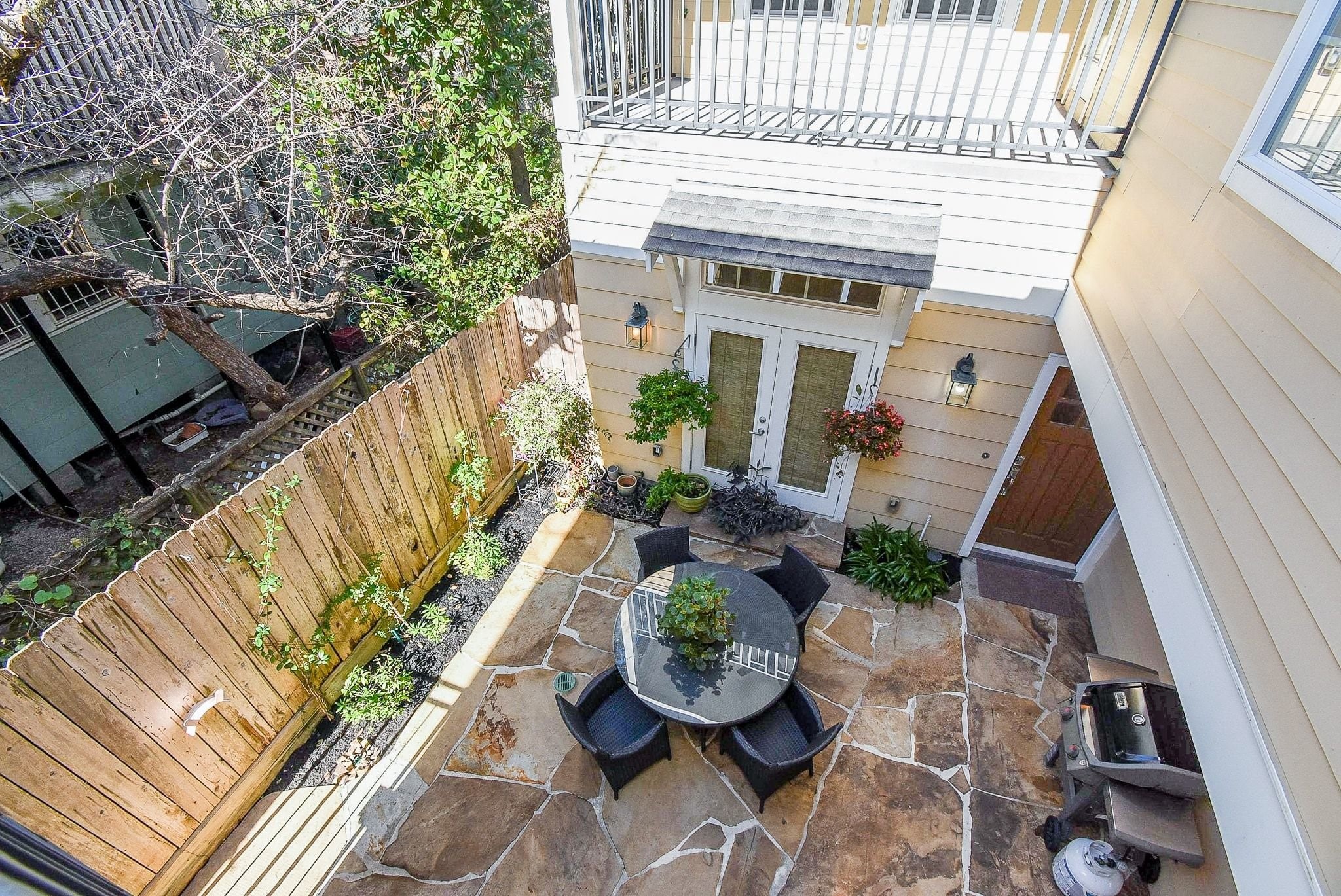 1036 Kern Street Houston, TX 77009 - Photo 28 of 47 This is the view of the courtyard area from the Juliet balcony off the Primary Suite.