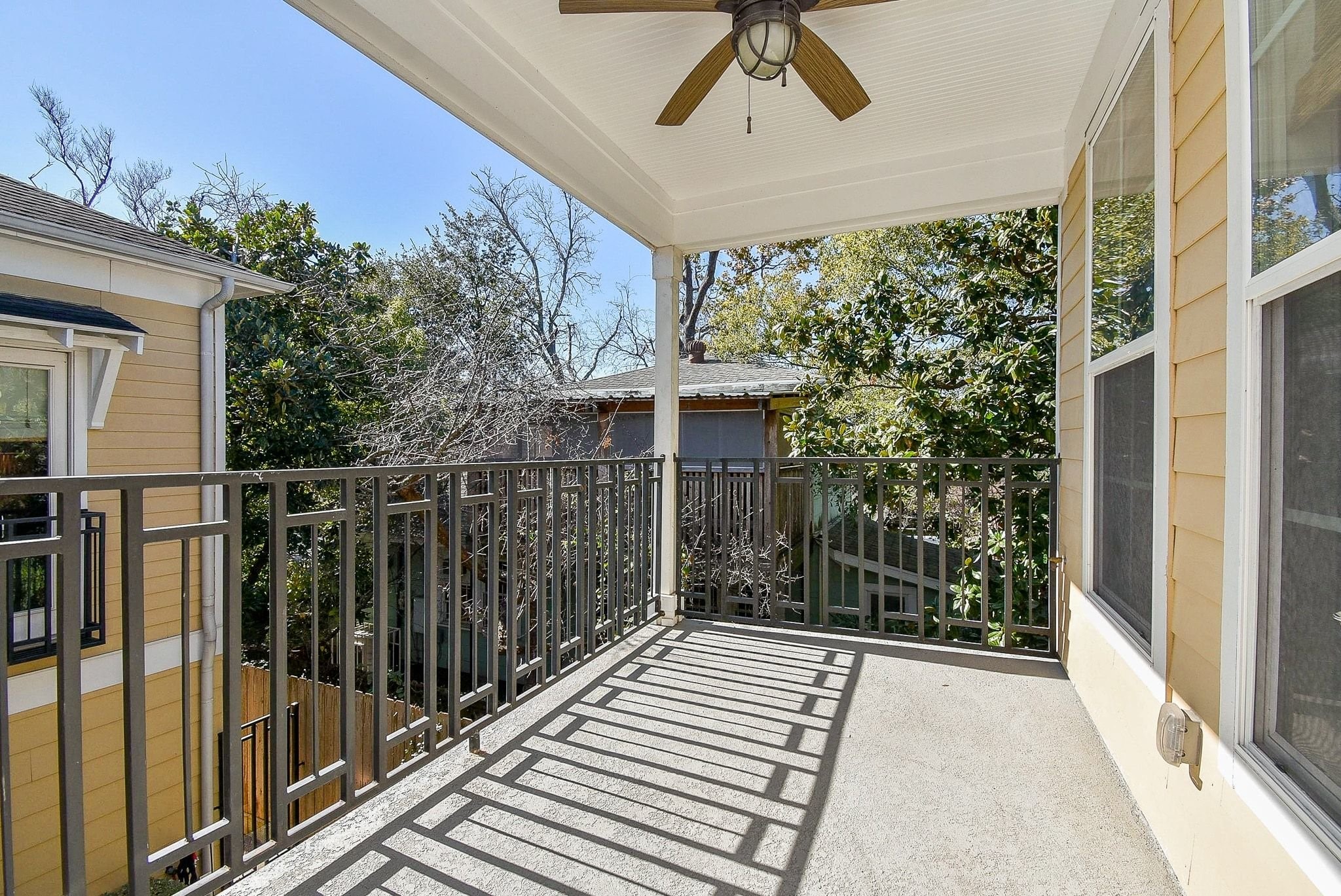 1036 Kern Street Houston, TX 77009 - Photo 36 of 47 Enjoy your very own fully covered outdoor patio with ceiling fan & iron railings. Enjoy a cup of coffee out here, or maybe a glass of wine as you wind down your evening.