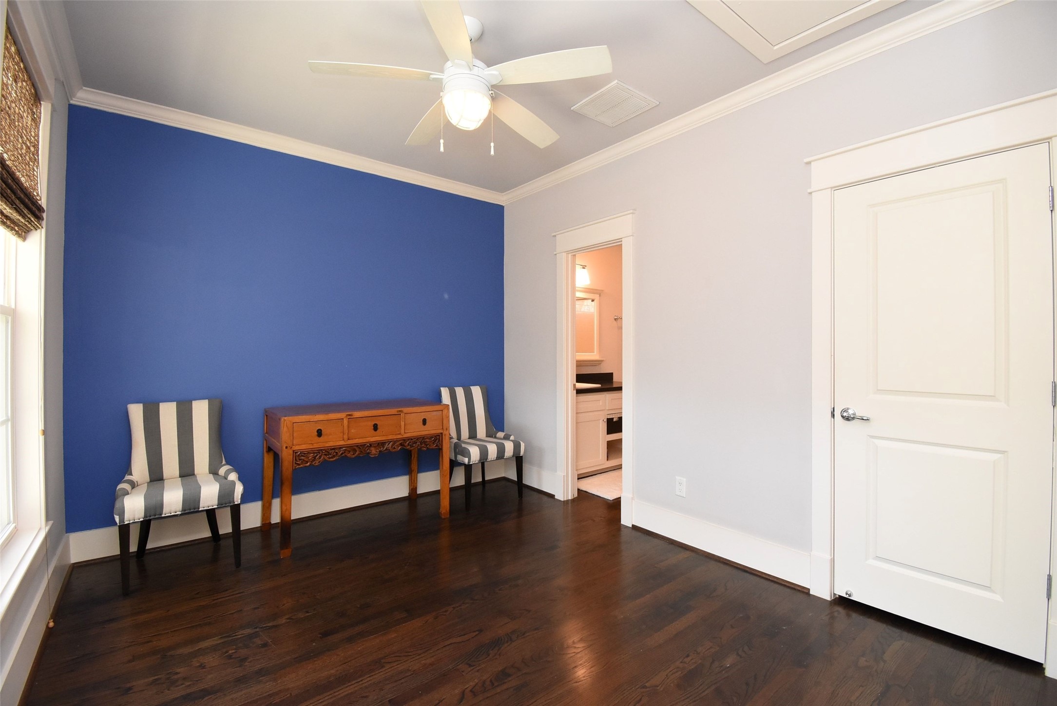 1036 Kern Street Houston, TX 77009 - Photo 40 of 47 The first of of 2 spacious secondary bedrooms towards the back of the house. This one has a sizeable walk-in closet with dresser built-ins.