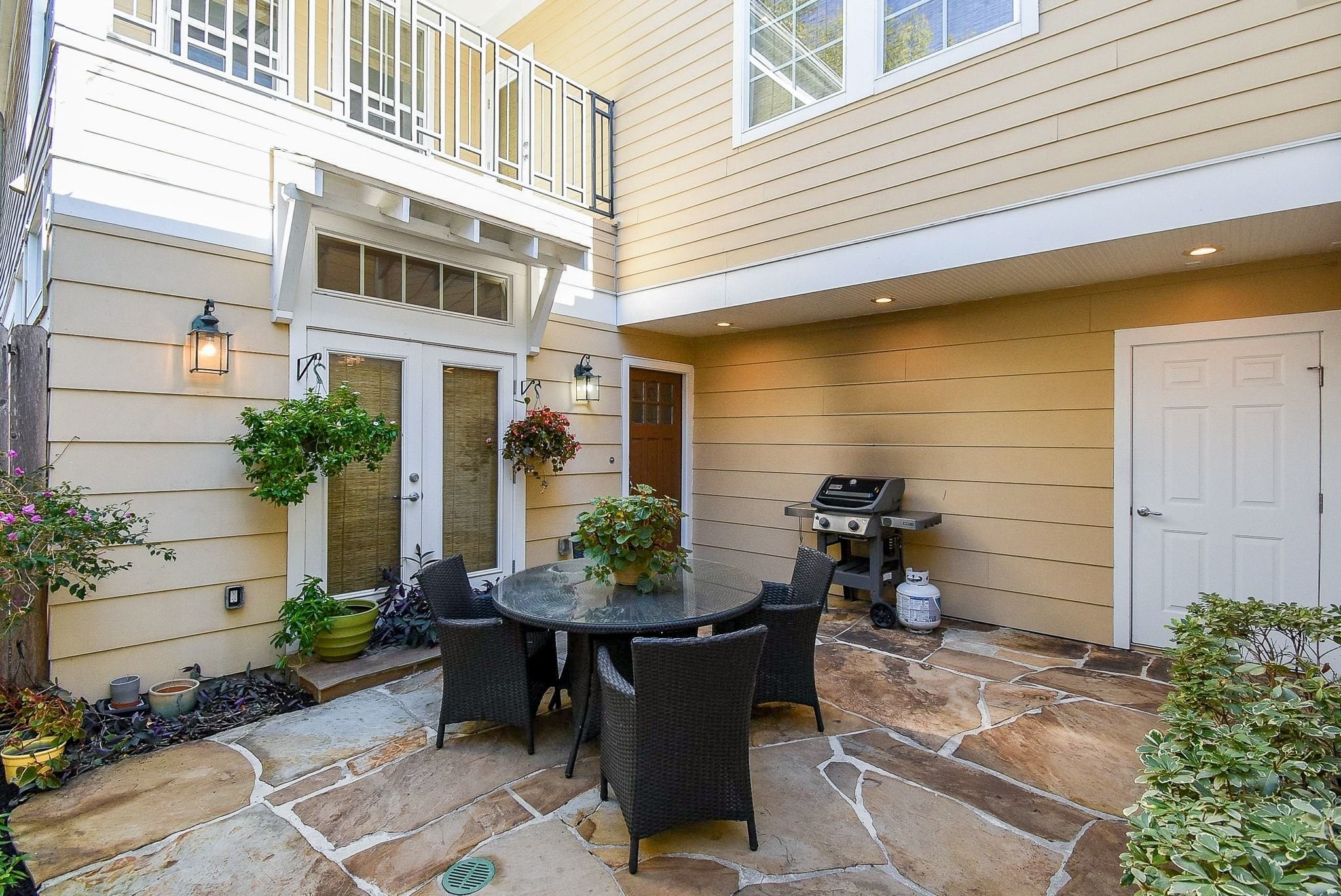 1036 Kern Street Houston, TX 77009 - Photo 4 of 47 The "Courtyard Plan" by the original builder sold out almost immediately each time one came on the market. If you prefer a "lock & leave" lifestyle, are looking for something low maintenance (no grass to mow!), or if you're someone with a green thumb who loves the ease and beauty of potted or hanging plants, this home might be perfect for you!