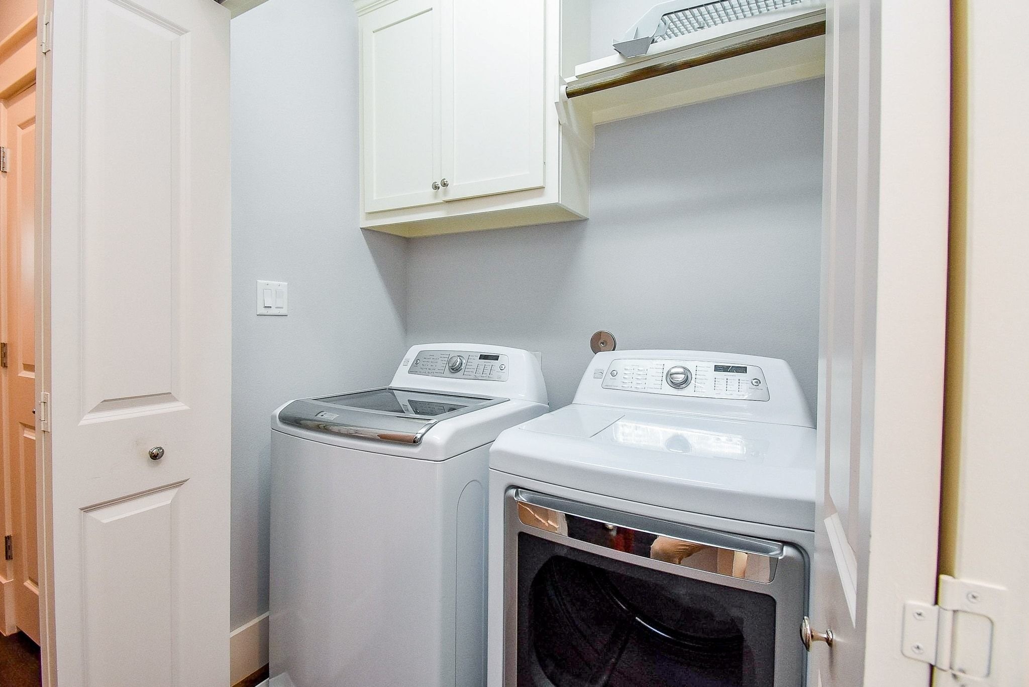 1036 Kern Street Houston, TX 77009 - Photo 46 of 47 The laundry room is centrally located upstairs and this washer & dryer set will convey with an accepted contract.