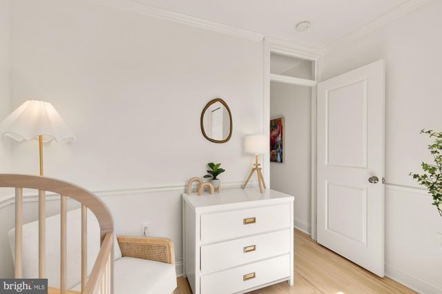 a view of a bedroom from a hallway