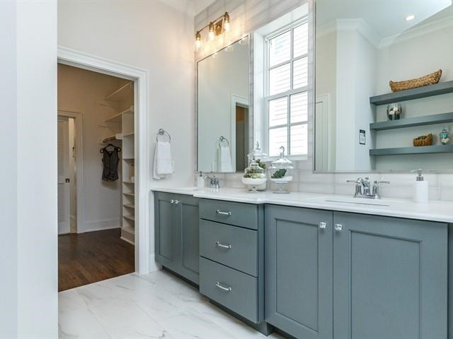 1017 Whitehall Circle Durham, NC 27713 - Photo 19 of 25 a bathroom with a double vanity sink mirror and double