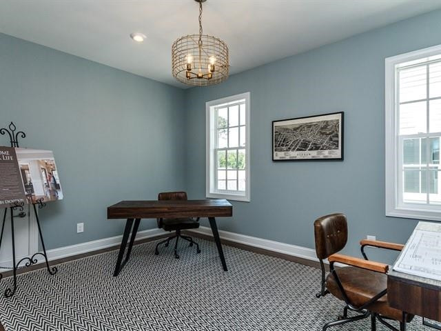 1017 Whitehall Circle Durham, NC 27713 - Photo 24 of 25 a work room with furniture and windows