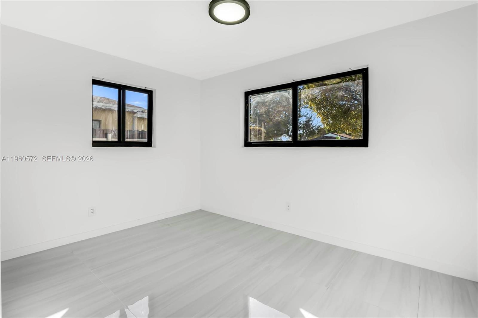 528 Northwest 3rd Court Hallandale Beach, FL 33009 - Photo 12 of 25 a view of a wall with a painting on the wall