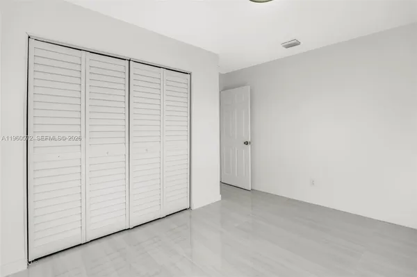 an empty room with closet