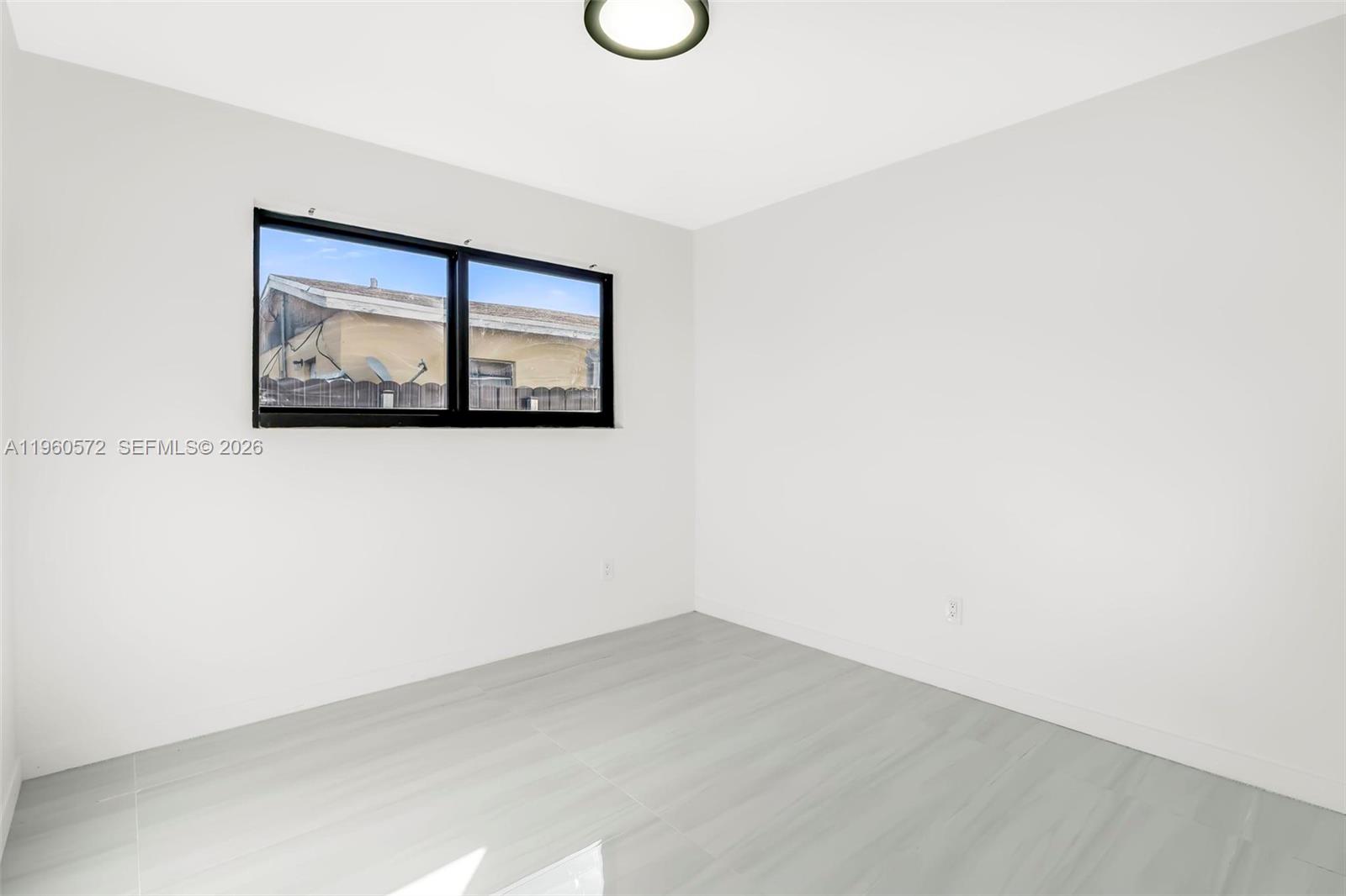 528 Northwest 3rd Court Hallandale Beach, FL 33009 - Photo 18 of 25 a view of a hallway with wooden floor