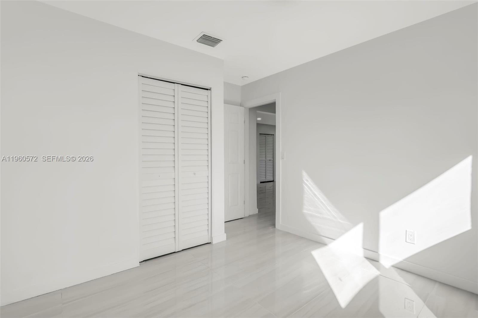 528 Northwest 3rd Court Hallandale Beach, FL 33009 - Photo 19 of 25 a view of an empty room