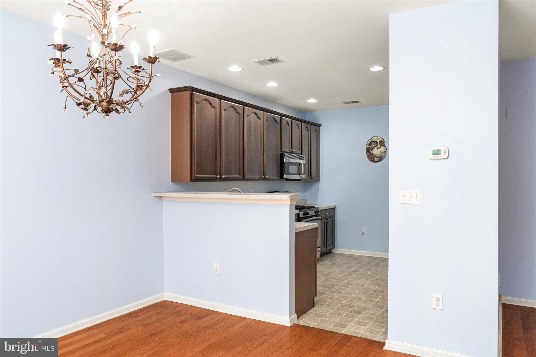 24 Blake Drive Pennington, NJ 08534 - Photo 13 of 28 a view of a storage & utility room with wooden floor