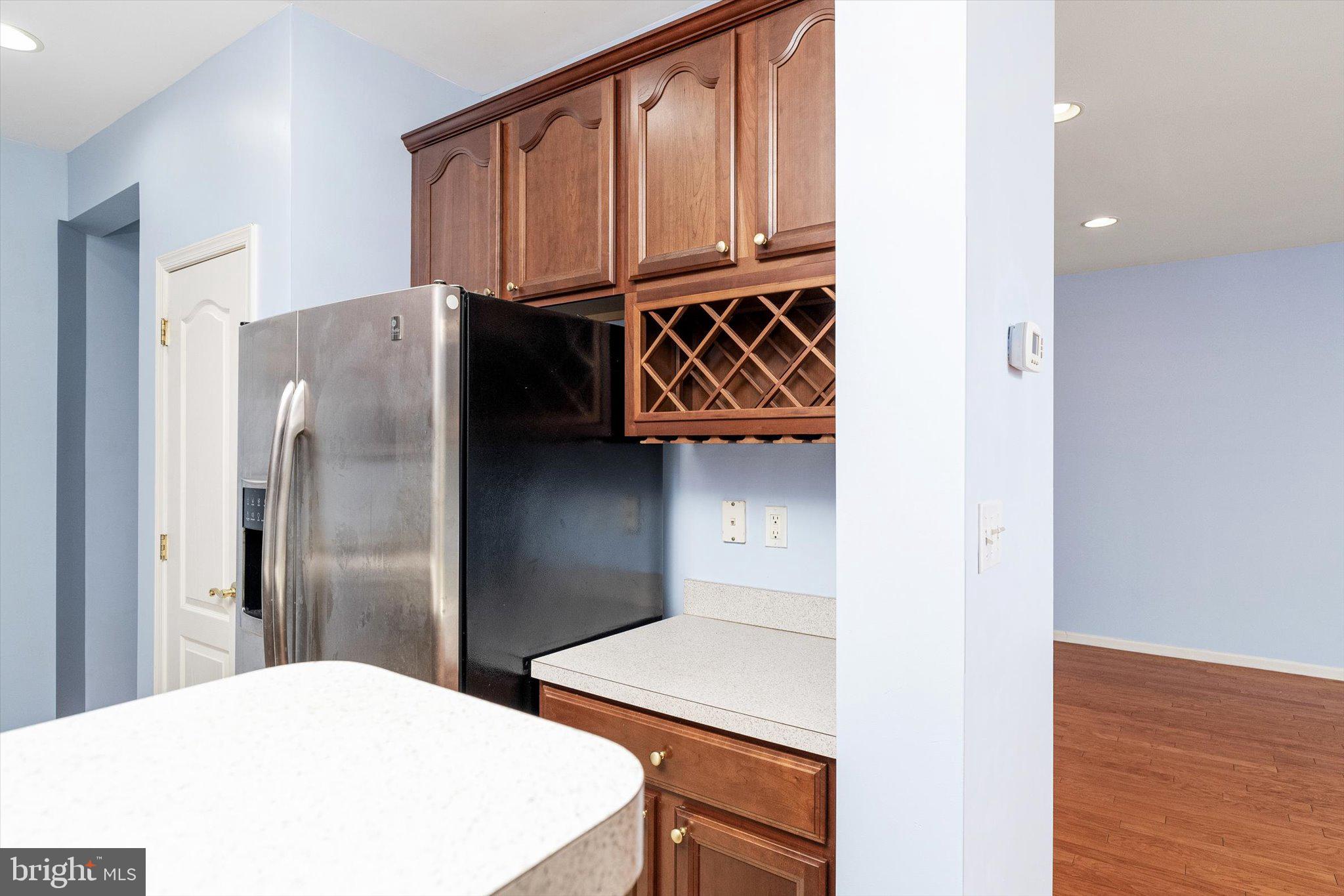 24 Blake Drive Pennington, NJ 08534 - Photo 16 of 28 a kitchen with stainless steel appliances a refrigerator and cabinets