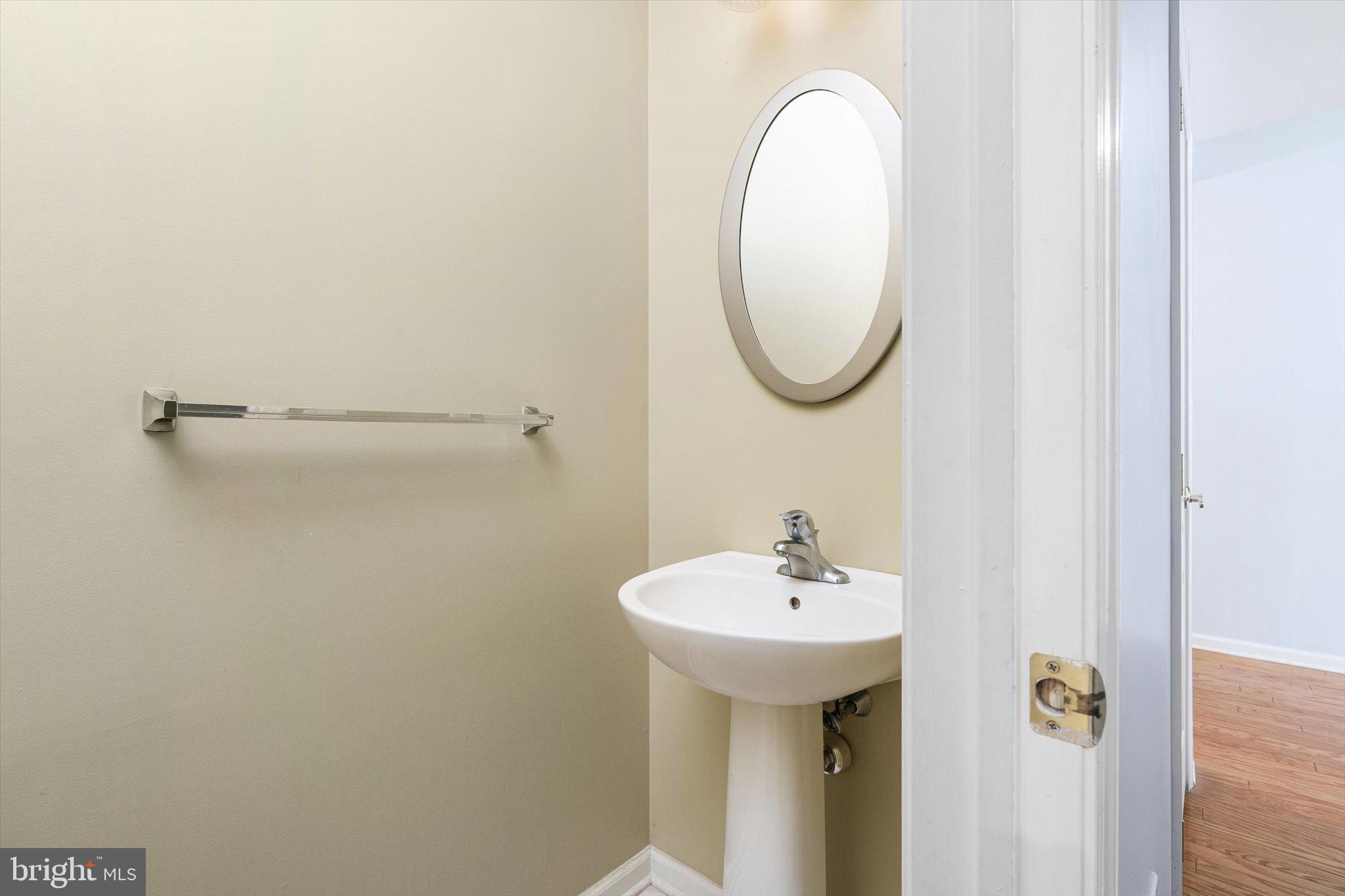 24 Blake Drive Pennington, NJ 08534 - Photo 17 of 28 a bathroom with a sink and a mirror