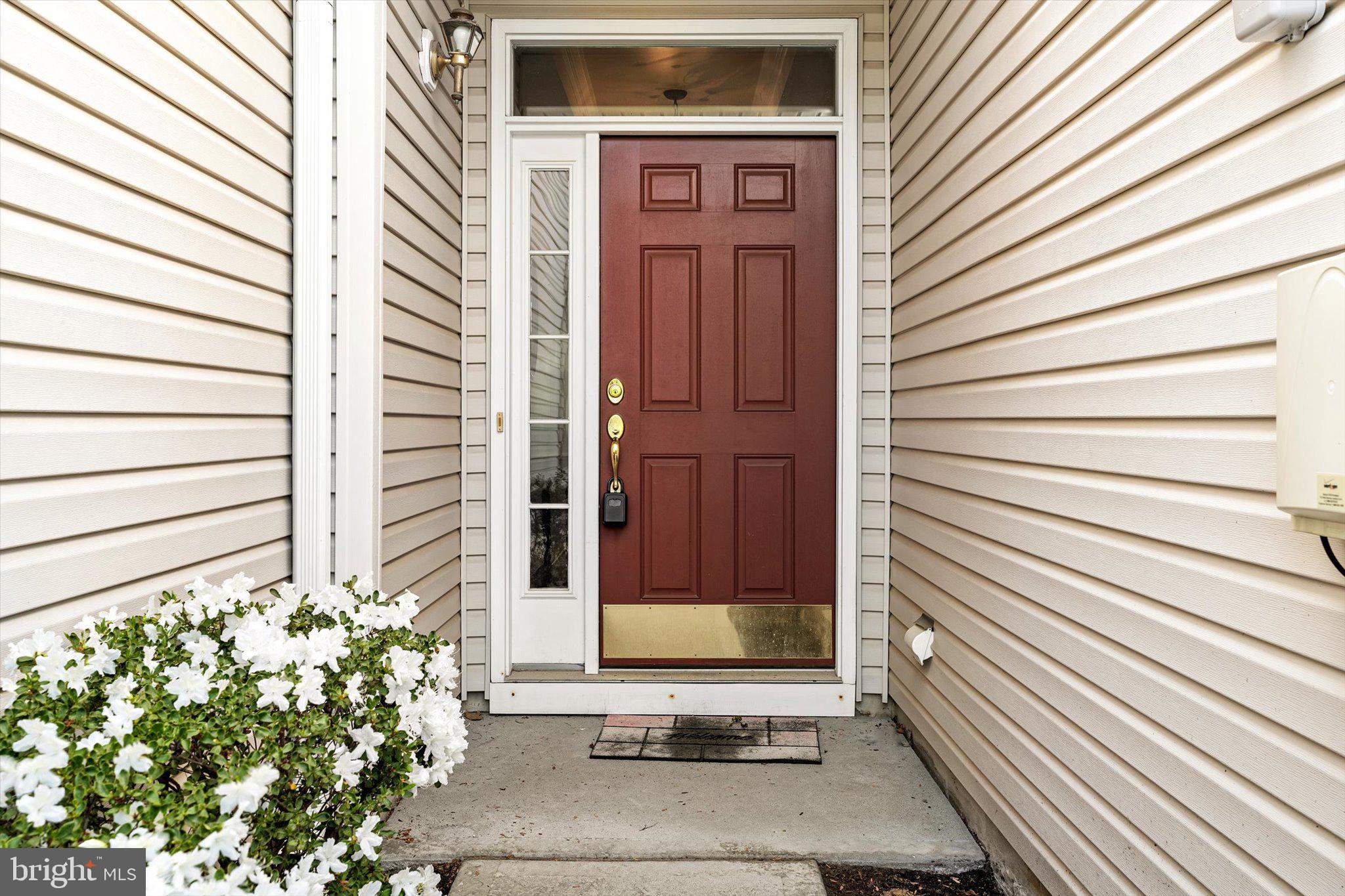 24 Blake Drive Pennington, NJ 08534 - Photo 2 of 28 a view of front door of house