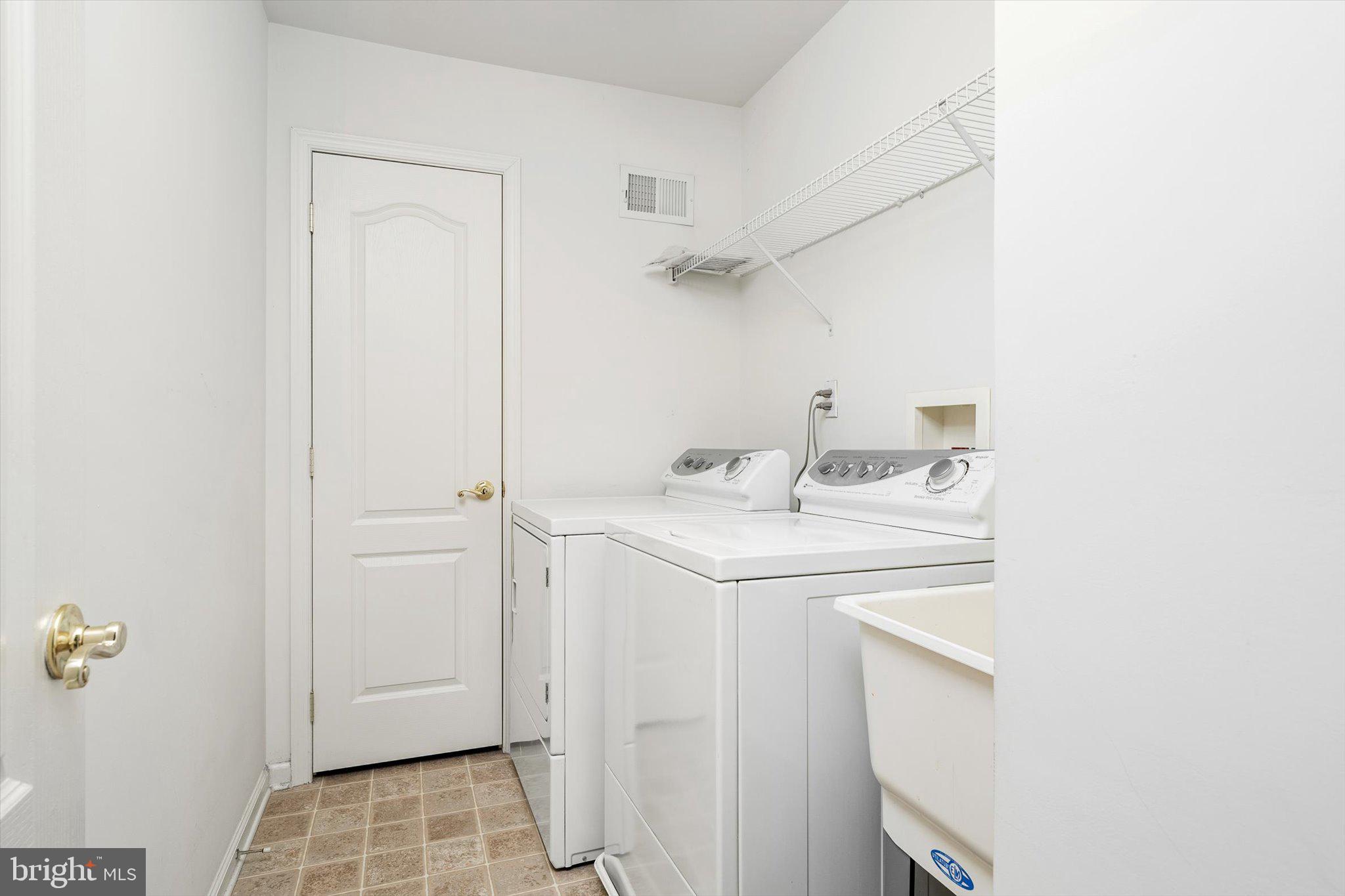 24 Blake Drive Pennington, NJ 08534 - Photo 23 of 28 a utility room with dryer and washer