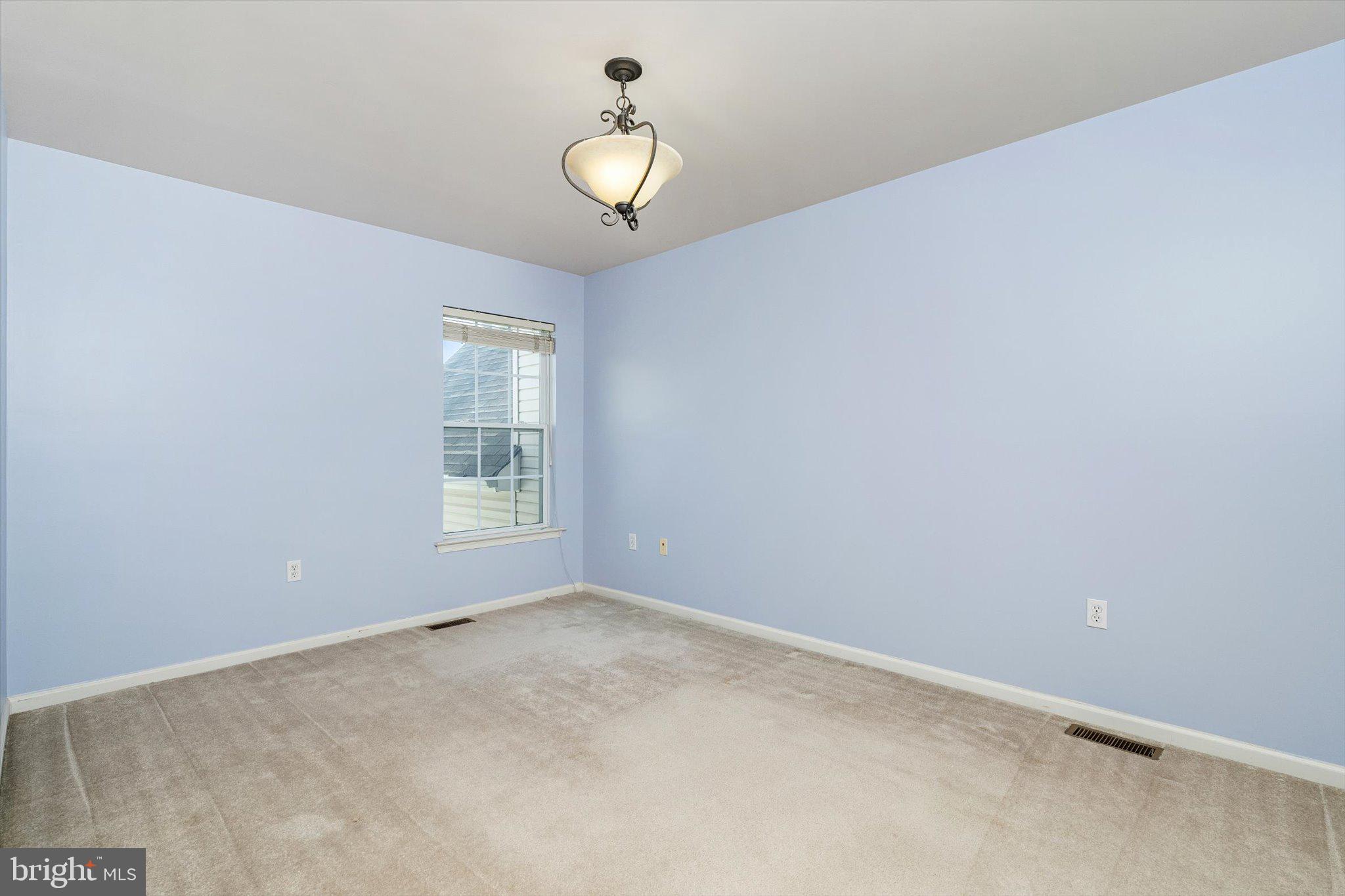 24 Blake Drive Pennington, NJ 08534 - Photo 24 of 28 a view of an empty room with a window