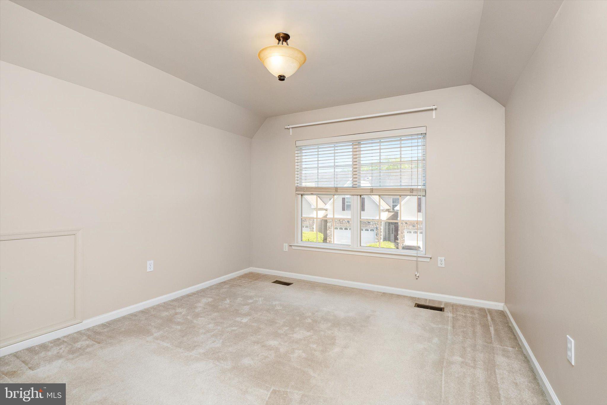 24 Blake Drive Pennington, NJ 08534 - Photo 25 of 28 an empty room with a empty space and a window