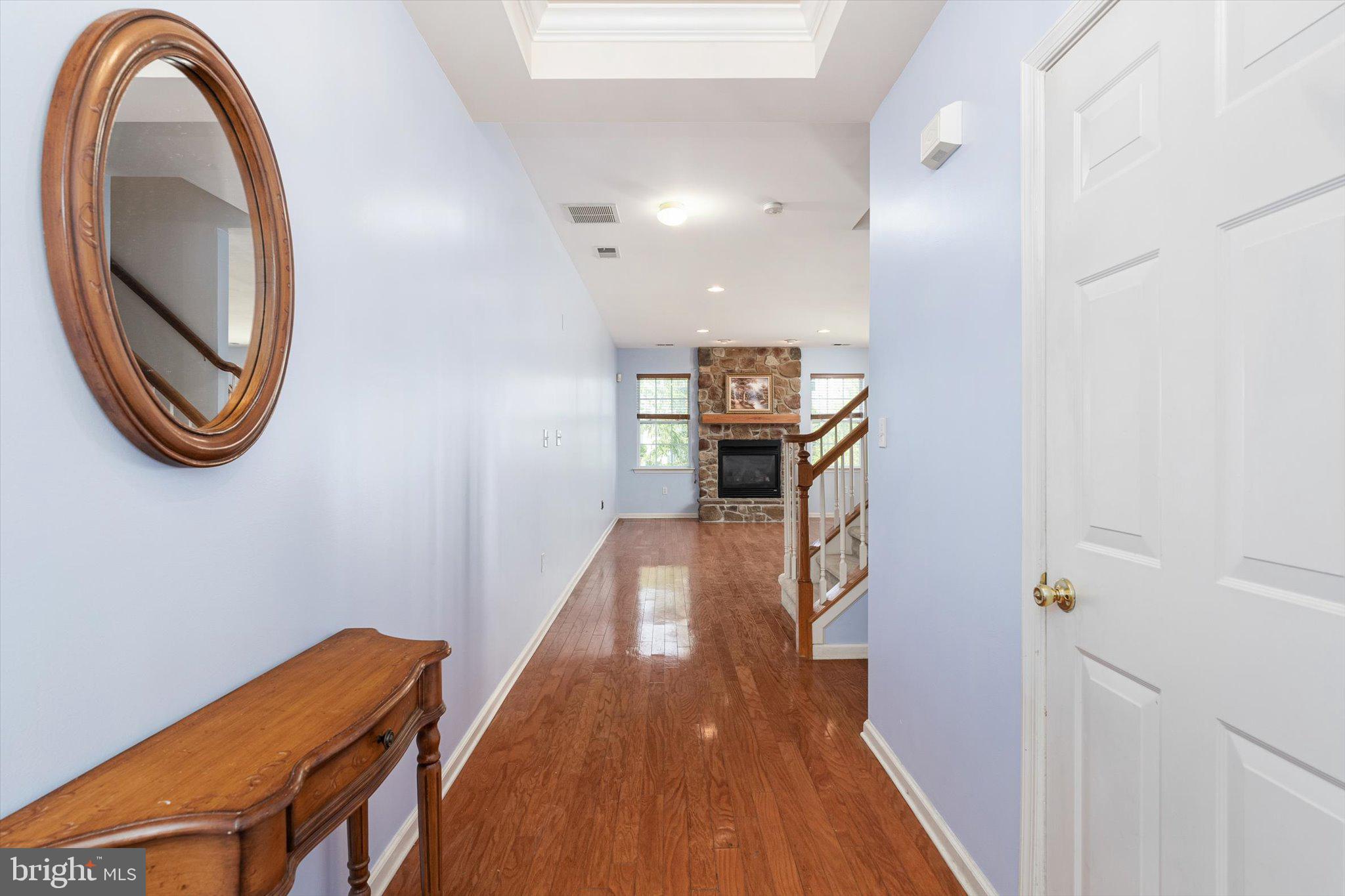 24 Blake Drive Pennington, NJ 08534 - Photo 4 of 28 a view of entryway and hall with wooden floor