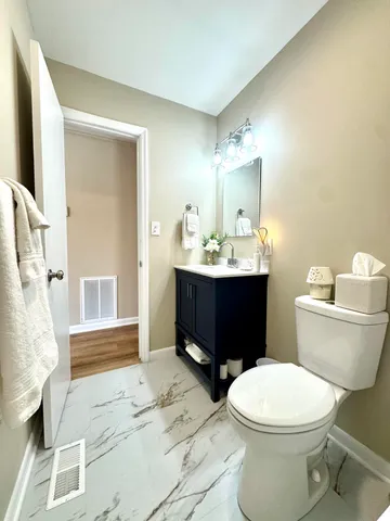 a bathroom with a shower curtain