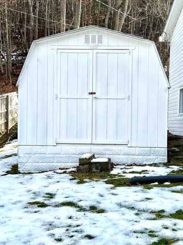 a view of a swimming pool with an outdoor space