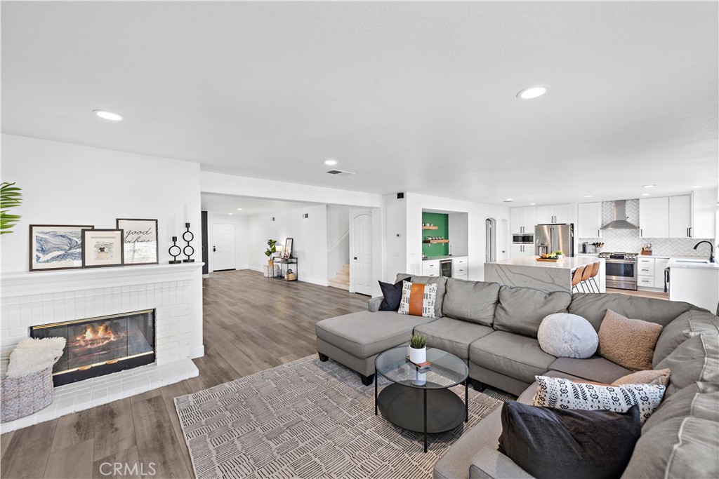 4314 Silver Spring Way Oceanside, CA 92057 - Photo 12 of 49 a living room with furniture and a fireplace