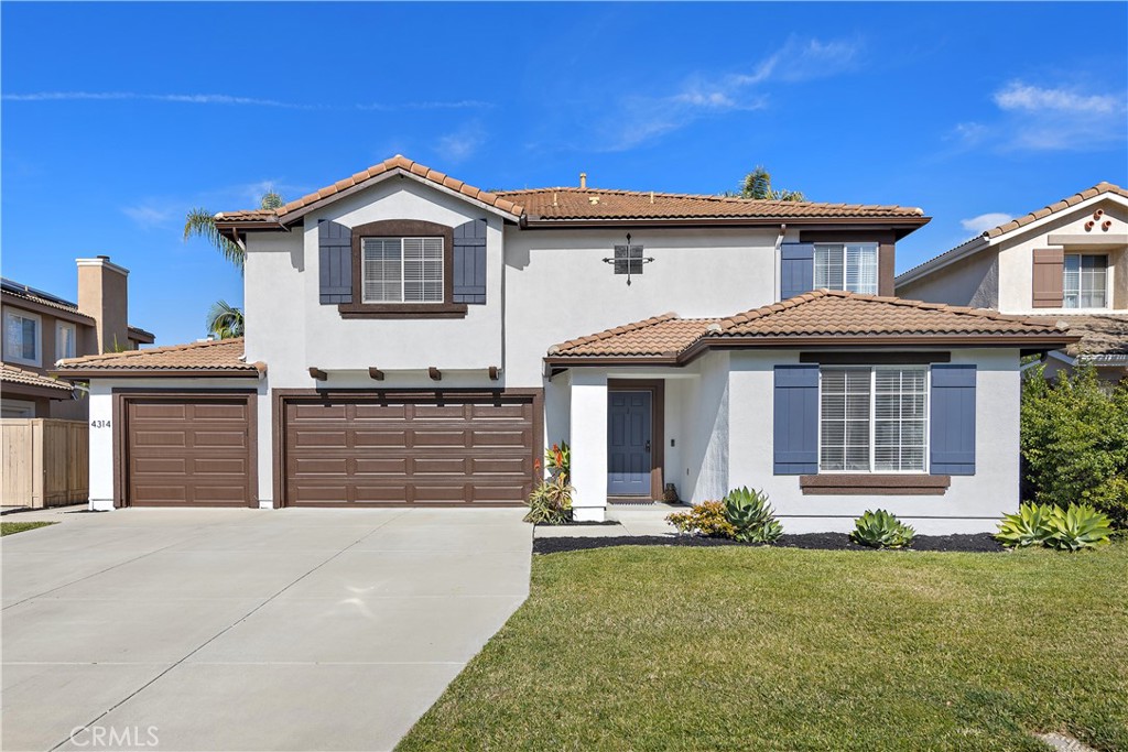 4314 Silver Spring Way Oceanside, CA 92057 - Photo 2 of 49 a front view of a house with garden
